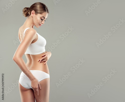 Cuadros en Lienzo Perfect slim toned young body of the girl