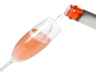 Canvas Print - Rose champagne pouring from bottle into glass isolated on white