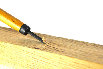 Wood carving tool on white background close up