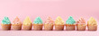 Row of delicious cupcakes on color background, space for text