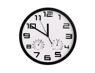 simple classic black and white round wall clock isolated on white. Clock with arabic numerals on wall shows 11:50 , 23:50