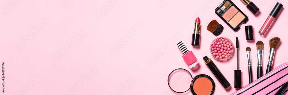 Makeup professional cosmetics on pink background. - obrazy, fototapety, plakaty 