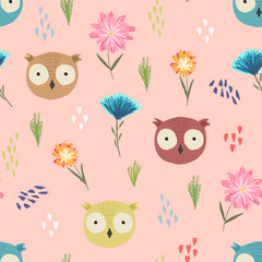  Cute peach color seamless pattern with cartoon owl heads, colorful dots and childish flowers. Funny pink summer hand drawn birds texture for kids design, wallpaper, textile, wrapping paper