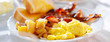 breakfast with eggs bacon and hashbrowns panorama
