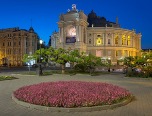 Wall Mural - square with flowers in front of opera theater in twilight time in Odessa in Ukraine