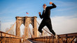 Businessman model jumping and celebrating business success