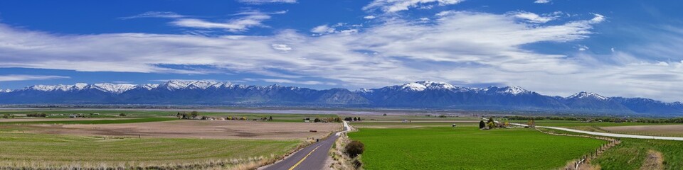 Tremonton and Logan Valley landscape views from Highway 30 pass, including Fielding, Beaverdam, Riverside and Collinston towns, by Utah State University, in Cache County along the Wasatch Front Range 