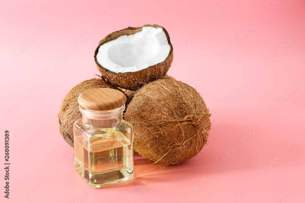 Composition with coconut oil on color background