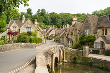 Village Of Castle Combe, Wiltshire, UK. Bridge Over River Bybrook