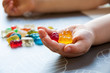 © Pixavril - Jelly sweets in a hand of kid