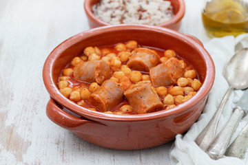 Sticker - chick-pea with sausage in ceramic pot