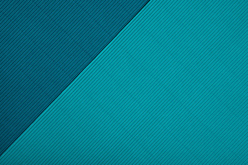 Abstract textured geometric paper emerald and blue-green duo colors background.