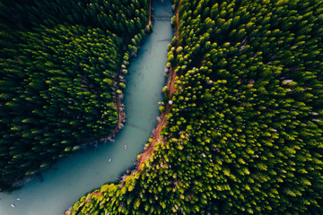 Wall Mural - Lake with small boats seen from a drone