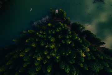 Wall Mural - Lake with small boats seen from a drone