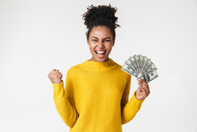 African Excited Emotional Happy Woman Posing Isolated Over White Wall Background Holding Money.