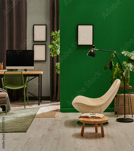 Modern Living Room With Grey Sofa And Frame Green Wall Close Up