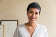© Jovo Jovanovic/Stocksy - Portrait of a beautiful short haired woman smiling