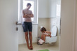 © Evgenij Yulkin/Stocksy - Little girl in the toilet