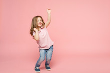 Little Cute Child Kid Baby Girl 3-4 Years Old Wearing Light Clothes Dancing Isolated On Pastel Pink Wall Background, Children Studio Portrait. Mother's Day, Love Family, Parenthood Childhood Concept.