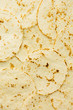 © Gourmet Photography/Stocksy - Freshly cooked soft flour tortillas, useful as background