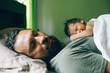 © Diane Durongpisitkul/Stocksy - Baby and Father sleeping