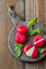 Canvas Print - Small snack cheeses on the wooden board