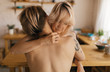 © Alexey Kuzma/Stocksy - lesbian women in love