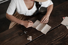 Young Woman Writing Notes