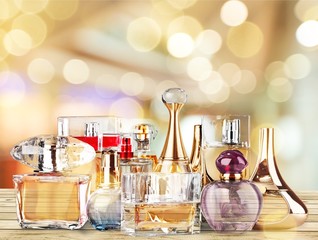 Aromatic Perfume bottles on background