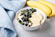 © fahrwasser - Banana dairy free nice cream or smoothie bowl topped with blueberry