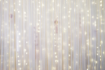 White curtain backdrop with small LED lights decoration