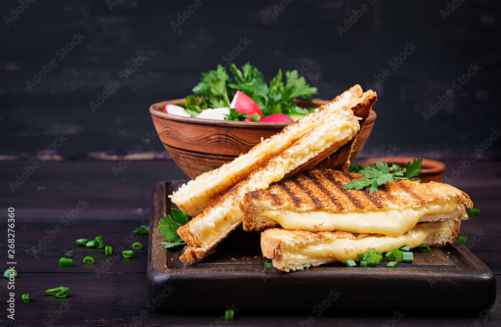 American hot cheese sandwich. Homemade grilled cheese sandwich for breakfast. - obrazy, fototapety, plakaty 