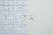 © gballgiggs - Picture of jigsaw puzzle white color,Puzzle pieces grid,Mosaic solution template,Top view,Copy space for text