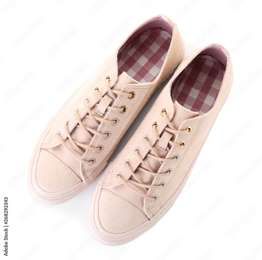 Pair of stylish casual shoes on white background
