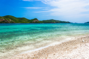 Sticker - Tropical island rock on the beach with blue sky. Koh kham pattaya thailand.