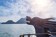 Chinese Dragon Head Wood Carving Tourist Junks Boat Travel In Northern Vietnam. Focus On The Head
