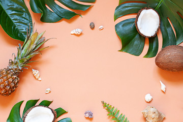 Wall Mural - Summer vacation concept frame with seashells and tropical leaves. Top view. Copy space