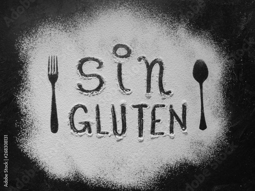 Gluten Free Flour With Text Gluten Free In Spanish Language With Spoon And Fork Silhouette Made With Flour On Dark Texture Background Buy This Stock Photo And Explore Similar Images At