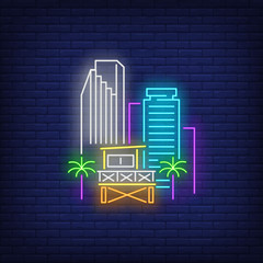 Aufkleber - Miami city skyscrapers and lifeguard station neon sign. Beach, tourism, travel design. Night bright neon sign, colorful billboard, light banner. Vector illustration in neon style.
