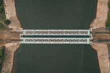 Steel Railroad Bridge With Rails Over River, Aerial Drone View,