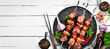 Pork Shish Kebab With Onions And Tomatoes. Barbecue. Top View. Free Space For Your Text. Rustic Style.