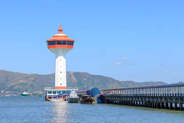 Wall Mural - Lighthouse on Andaman sea, custom and immigration office at border to Myanmar, Ranong, Thailand