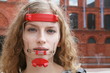 Girl with Braces and Orthodontic Headgear