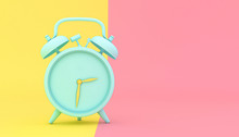 Stylized Alarm Clock On A Yellow And Pink Background