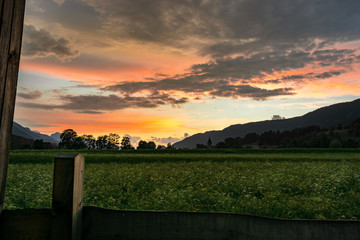 Wall Mural - colorful sunset after the passage of a thunderstorm in slovenia, close to the border of austria and 