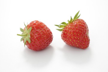 Two strawberries isolated