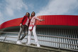 © Yakobchuk Olena - Two hipster girls on city ramp parapet