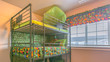 Clear Panorama Cozy room interior with a colorful triple bunk bed for children