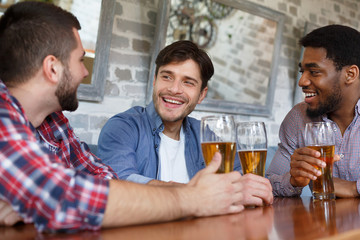 Wall Mural - Happy Friends Meeting In Bar And Drinking Beer