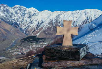 Wall Mural - Small shrine near famous landmark Tsminda Sameba church (english: Holy Trinity) near Gergeti village, Georgia